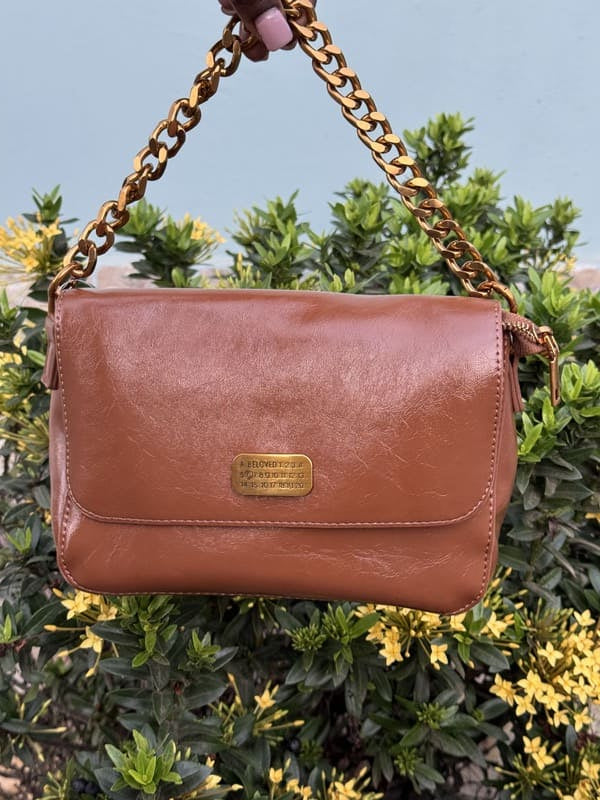 Glossy holdall